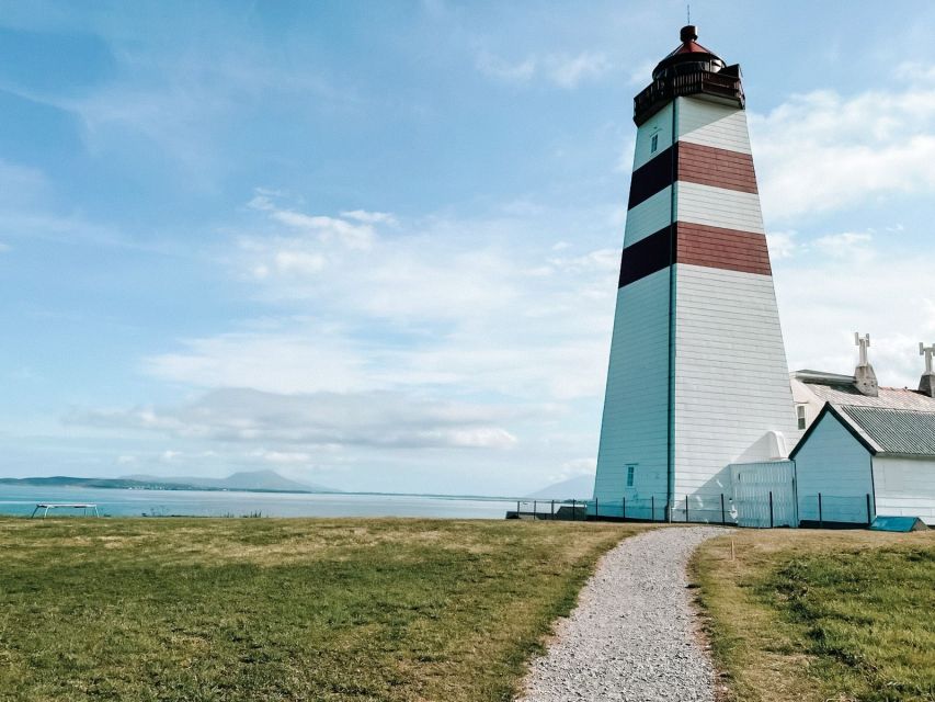 Ålesund: Ålesund and Surrounding Islands Audio Guide Tour - Alnes: fishing-island atmosphere and Alnes Fyr lighthouse entry