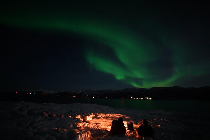 Aurora tour with free portrait and bonfire - When the aurora is dim, your guide’s job gets harder