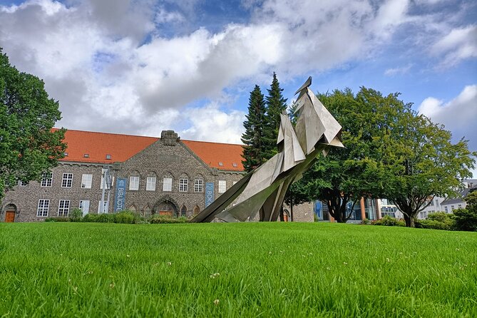 Bergen in Your Pocket: Landmarks and Lore Audio Tour - Henrik Ibsen, theater buildings, and the Bergen Cathedral façade
