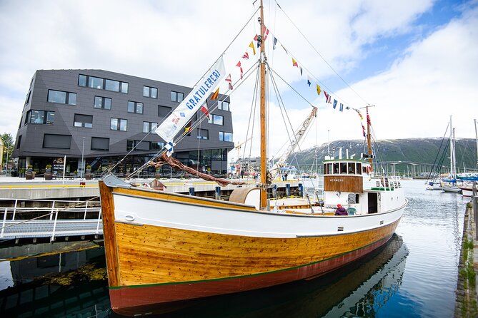 Fjord & History Cruise - Onboard Comfort: Thermal Suits, Hot Drinks, and a Real Small Crew