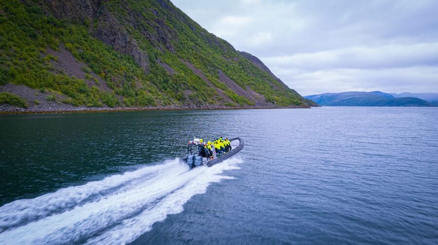 From Alta: Experience Seiland National Park - What you get included: thermal suits, snack, and real boat safety gear