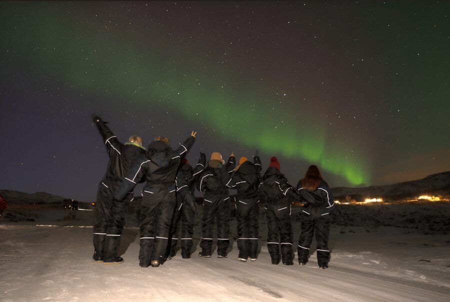 From Tromsø: Northern Lights Tour in Minibus with Photos - Waiting Outdoors: Snacks, Hot Drinks, and the Photo Moment
