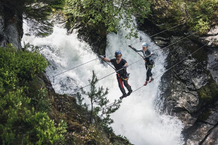 Geiranger: Zipline Park Experience - The via ferrata trail: protected steps, river crossings, and choosing your difficulty