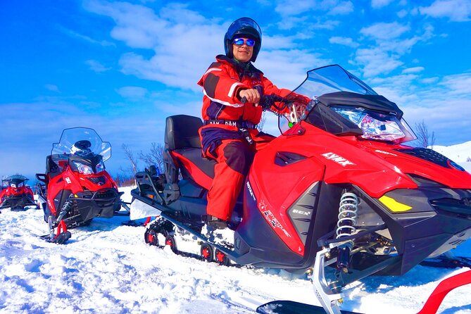 Guided Lyngen Alps Snowmobile Tour From Tromso - Warming up at the basecamp lodge, fish soup and coffee