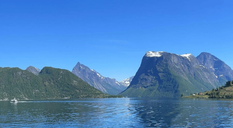 Hjørundfjord Fjord Cruise Afternoon Rountrip from Ålesund - Passing Trandal, Sæbø, and Urke: fjord villages you can spot in motion