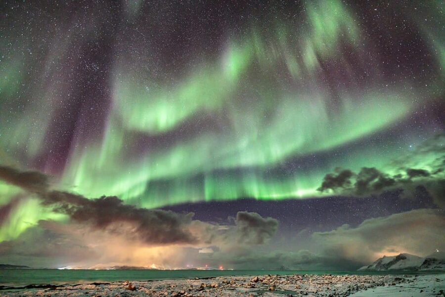 Lyngenalps: Northern Lights Snowmobile Safari - Meeting at XLyngen resort by the seaside and getting ready to ride