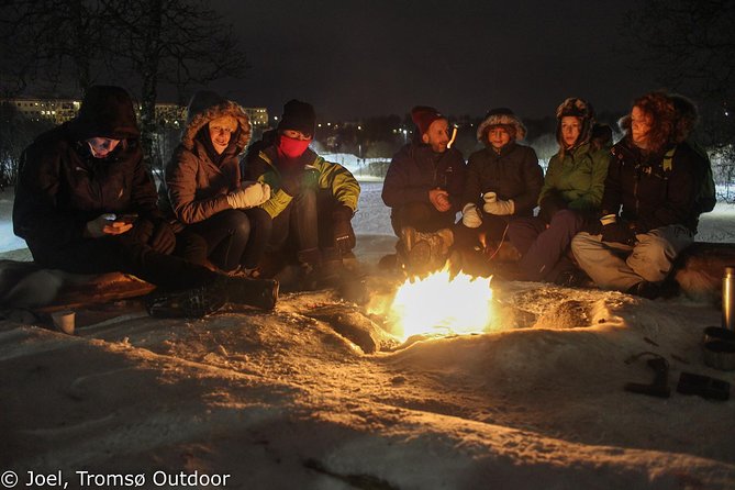 Snowshoe trip with a campfire in Tromso - Tobogganing Down the Hill: The Part That Brings Out Your Inner Kid
