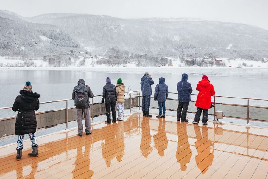Tromsø: Arctic Fjord Cruise With Stop On Land At Fish Racks - Rya visit and food tasting: where the cruise turns human