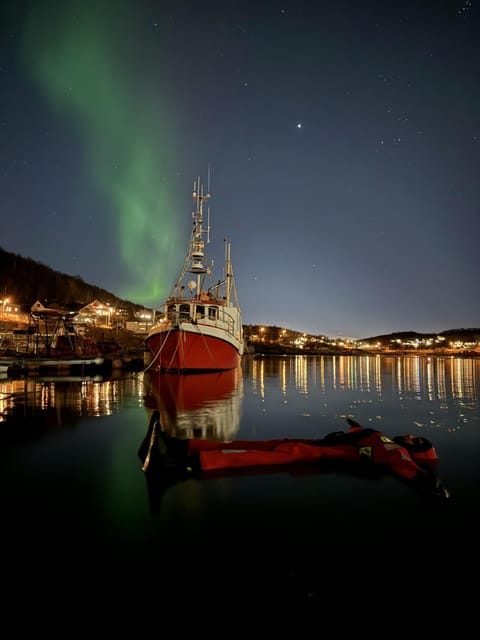 Tromsø: Arctic Fjord Floating in Survival Suit - Short water transport and breaks: why they make the swim better