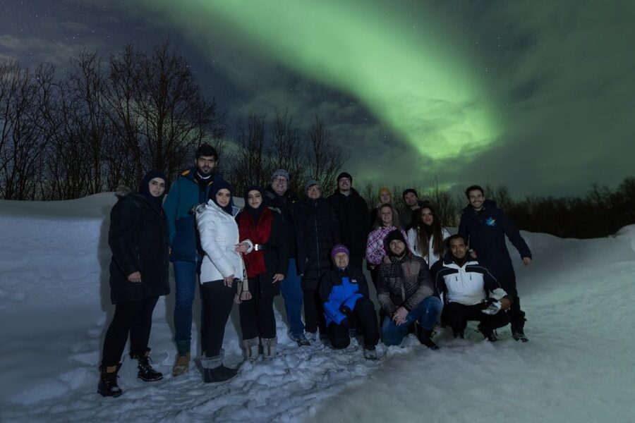 Tromsø: Aurora Borealis, Campfire, Hot Meal, Arctic Tour - The aurora hunt: how the guide finds gaps