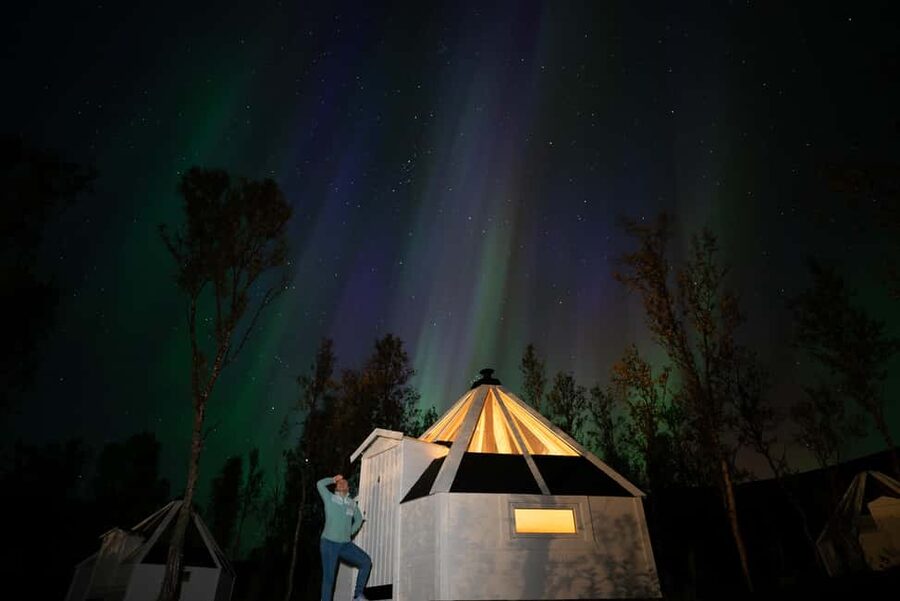Tromsø: Aurora Crystal Lavvo Overnight Stay with Activities - Your day at the basecamp, from fish soup to forecast