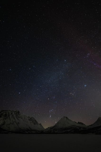 Tromsø: Aurora Tour with Photos, Campfire and Arctic Food - Staying Warm and Safe: Thermo Suits, Warmers, and Real Foot Advice