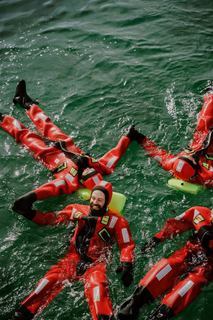 Tromsø city center Urban Floating experience - Kitting up: layers on, rescue suit on top