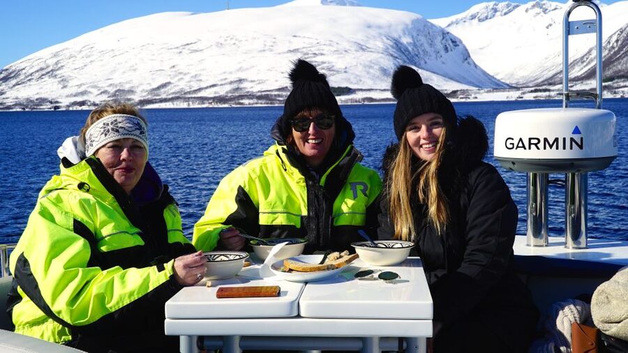 Tromsø: Fjord Cruise by Luxury Yacht - Getting warm fast: thermal suits, heated interior, and real cold