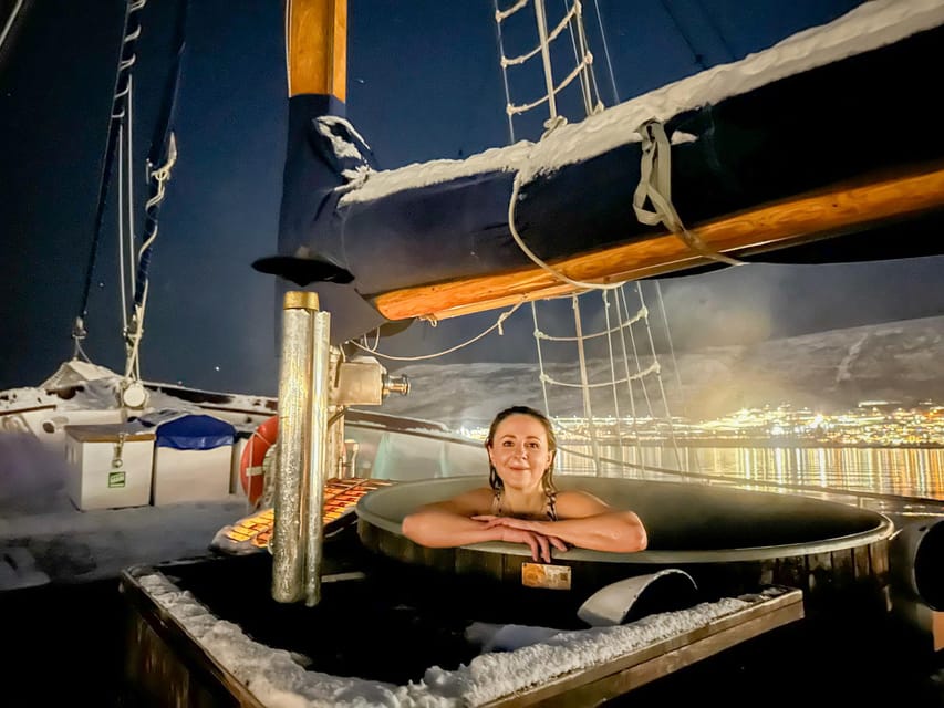 Tromso: Luxury Northern Lights Cruise with Hot Tub & Dinner - Inside the yacht: warm saloon, showers, and cozy extras