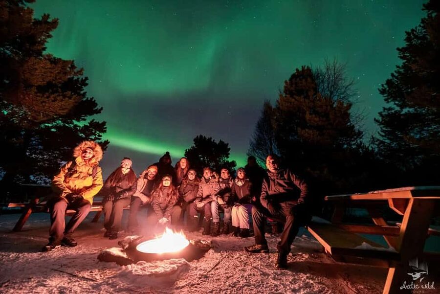 Tromsø: Northern Lights Chase by a comfortable bus - Starting point and meeting logistics: Magic Ice Bar to Kaigata 4