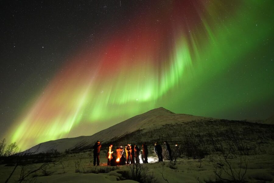 Tromsø: Northern Lights Tour with Free Professional Portrait - Van Time: why the tour leaves Tromsø lights behind fast