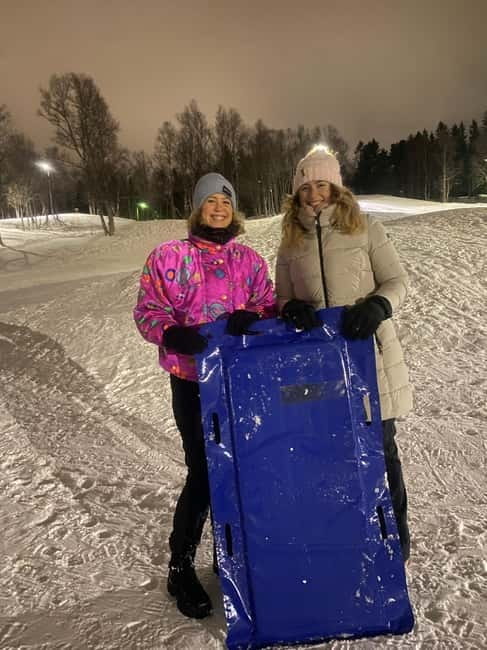 Tromsø: Snow Sledding, Mini Skiing, Lasso and Reindeer Hides - Toboggan mats on a snowy slope: the adrenaline, plus the climb back