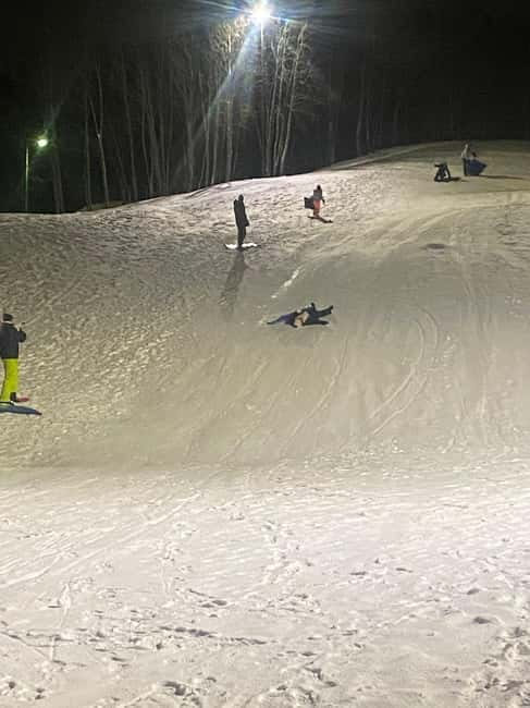 Tromsø: Snow Sledding, Mini Skiing, Lasso and Reindeer Hides - Reindeer hides, Norwegian snacks, and hot drinks by the bonfire